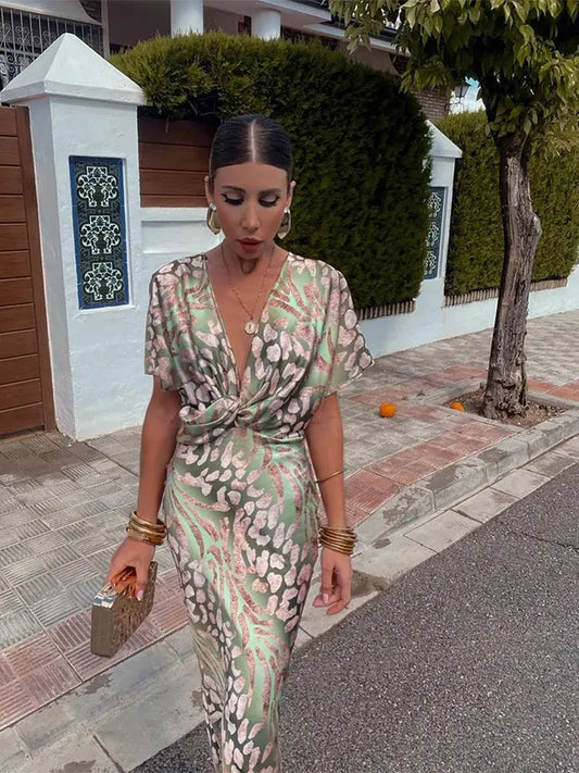 https://cdn.shopify.com/s/files/1/0657/5138/4294/files/Elegant-Printed-Satin-Midi-Dress-For-Women-Chic-V-neck-Short-Sleeve-Pleated-Bodycon-Dresses-Summer_915db6e7-9434-4358-aa39-918b2a4f5211.webp?v=1746095466