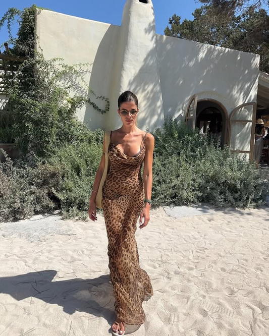 https://cdn.shopify.com/s/files/1/0657/5138/4294/files/Feliciana_Adjustablebelt_Leopardmaxidress_2_20dc1e9a-255f-4475-97cb-3f8d2e07cc5e.png?v=1745595580