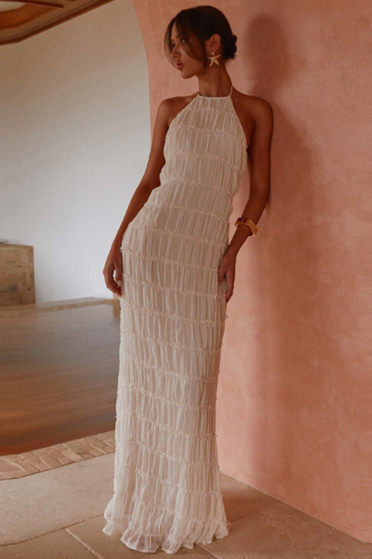 https://cdn.shopify.com/s/files/1/0657/5138/4294/files/Isadora_Ethereal_elegance_Halter_maxi_dress_c110e3c0-61e5-41b3-bee8-2f84d07a6a49.png?v=1745596322